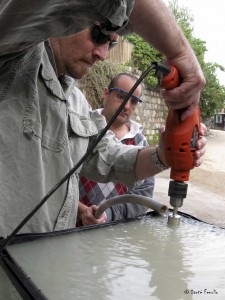 What a college education overlooks. Drilling drain holes through glass. Happily, we finally figured out how to do this; it only took us 60 seconds to drill each hole.