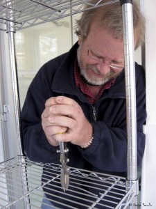 How to get a strong handshake: we clipped the shelves to accommodate the terrarium drains.